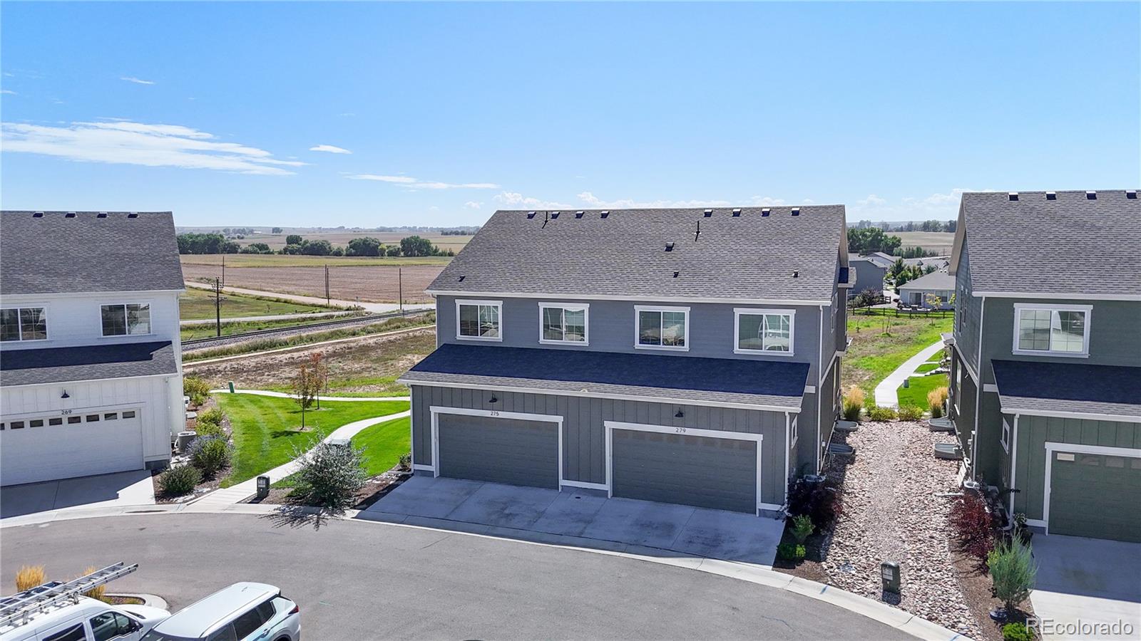 275 Dipper Court Berthoud, CO 80513 - Photo 2 of 34 a aerial view of a house with a swimming pool