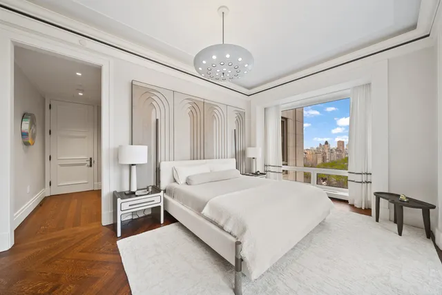 a large kitchen with stainless steel appliances granite countertop a lot of counter space and a sink
