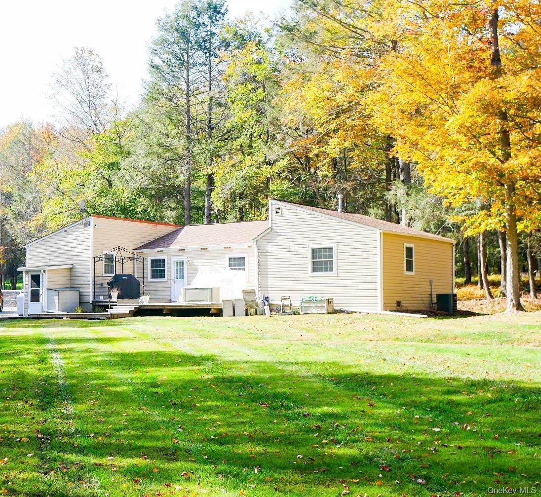 186 Schumway Road Neversink, NY 12765 - Photo 13 of 17 a house view with a sitting space and garden