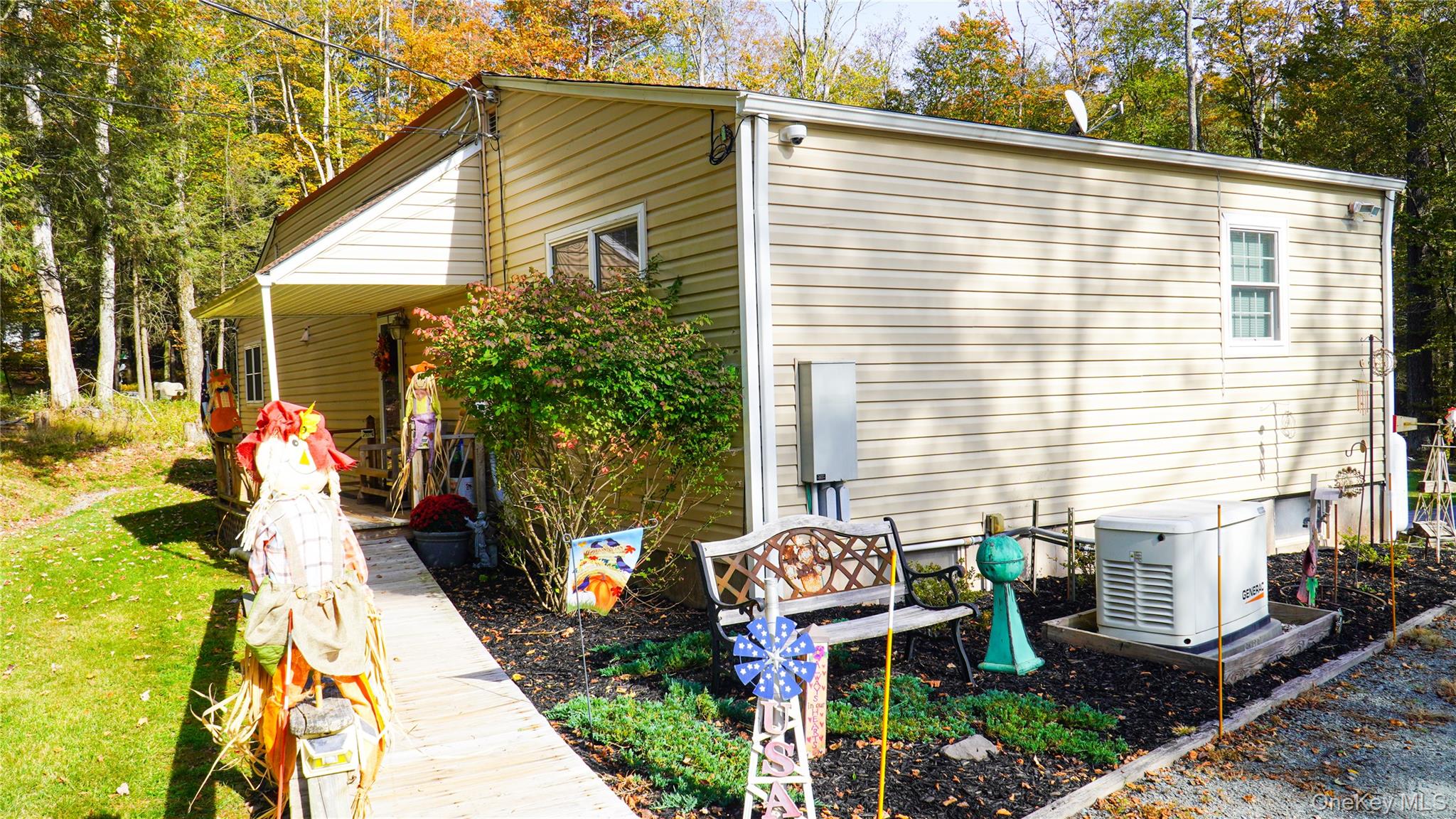 186 Schumway Road Neversink, NY 12765 - Photo 2 of 17 a front view of a house with garden