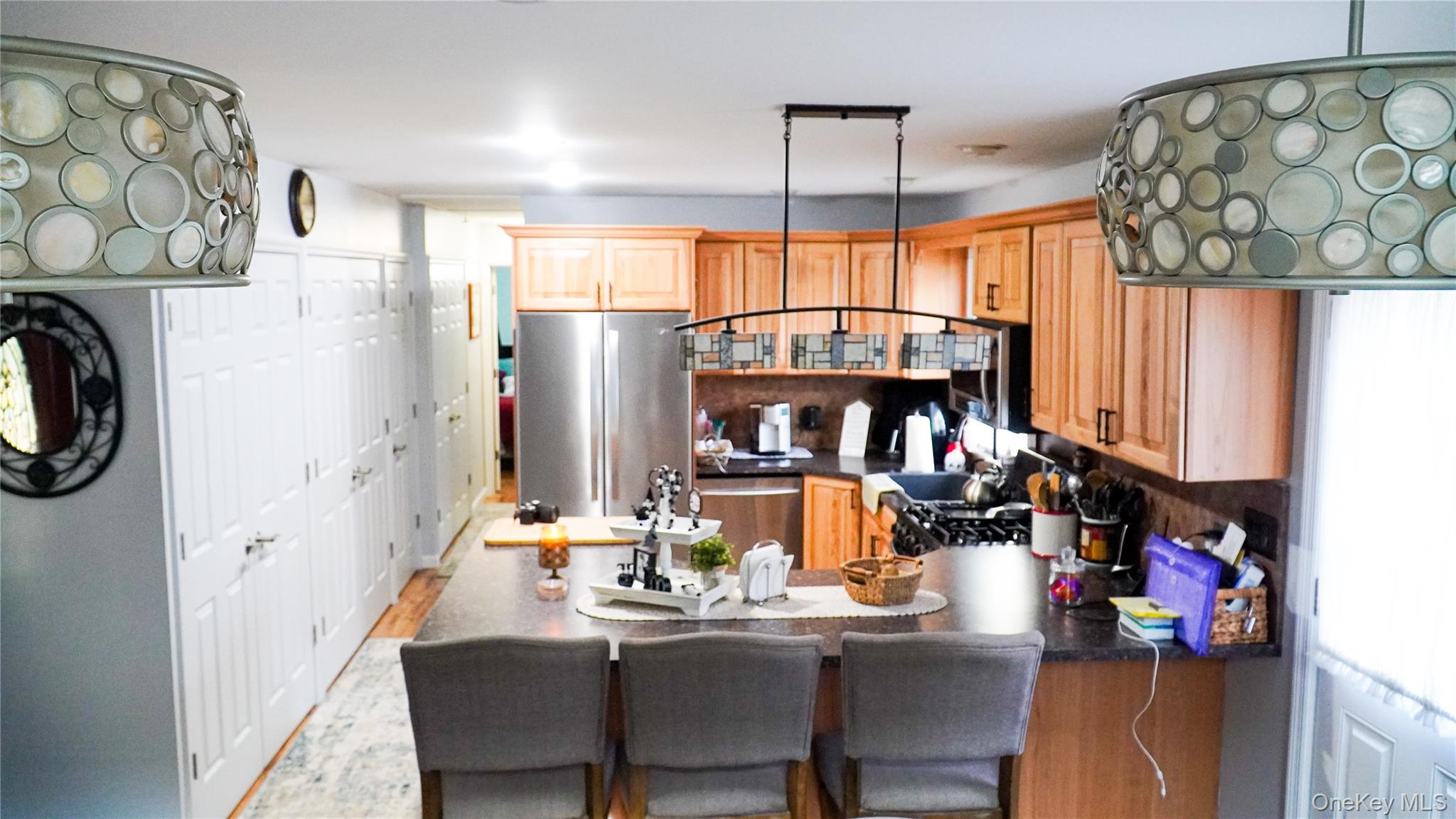186 Schumway Road Neversink, NY 12765 - Photo 6 of 17 a dining table chairs next to a window with kitchen view