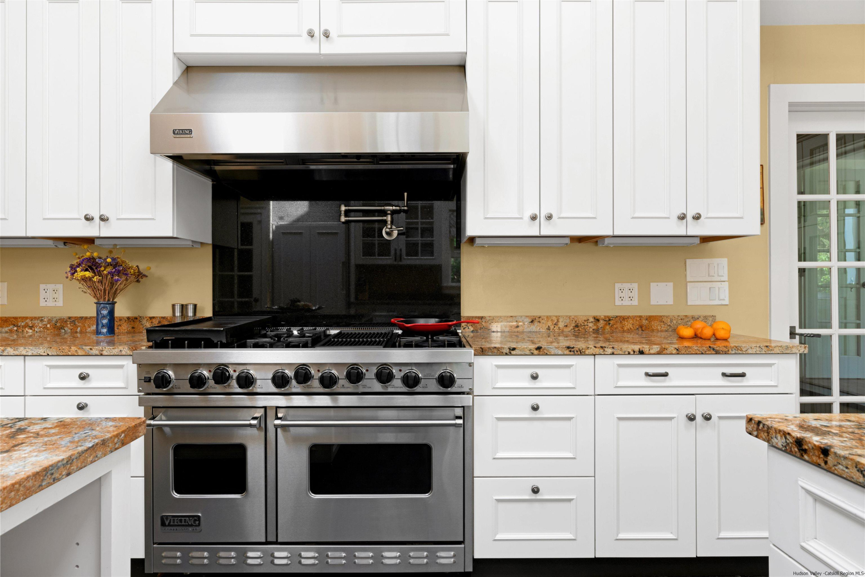 42 Union Center Road Ulster Park, NY 12487 - Photo 17 of 35 a stove top oven sitting inside of a kitchen