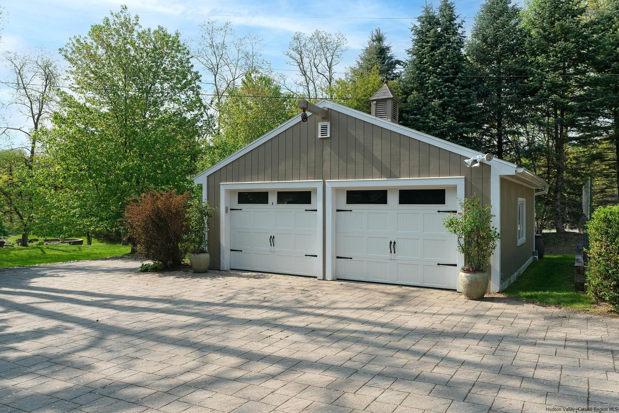 42 Union Center Road Ulster Park, NY 12487 - Photo 33 of 35 a view of a white house with a yard and large tree