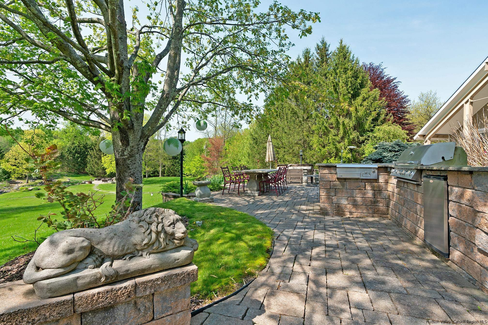 42 Union Center Road Ulster Park, NY 12487 - Photo 5 of 35 a view of backyard with seating area and green space