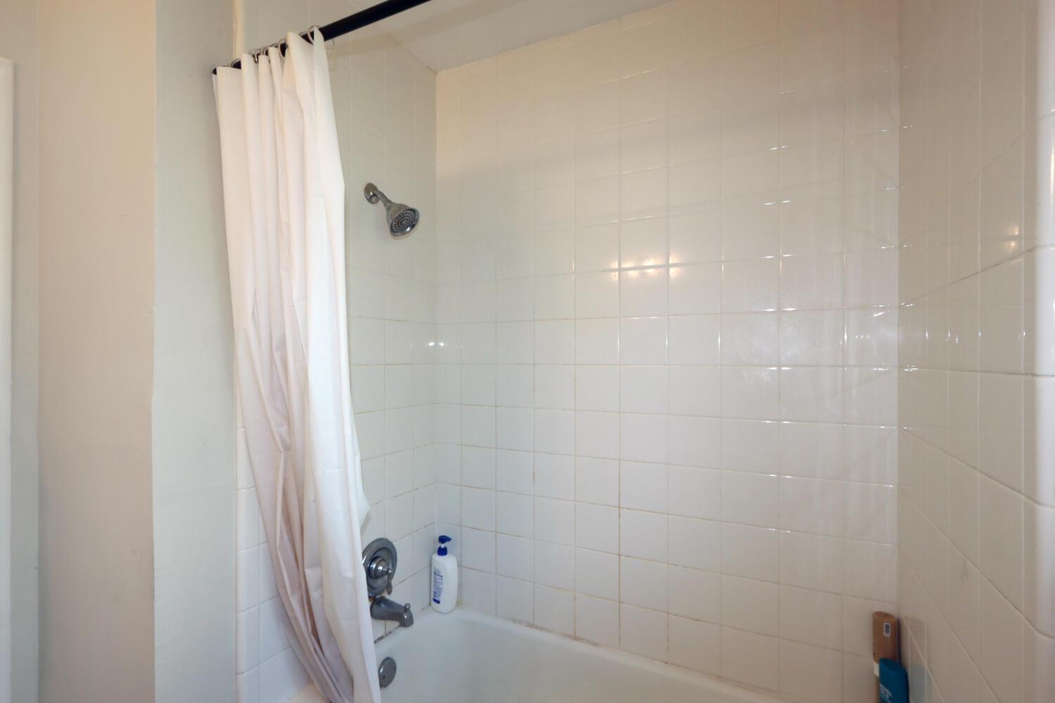 520-522 Oeste Drive Davis, CA 95616 - Photo 20 of 54 a bathroom with a bathtub and shower