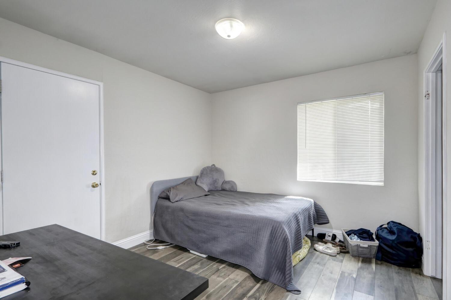 520-522 Oeste Drive Davis, CA 95616 - Photo 21 of 54 a bedroom with a bed and a closet