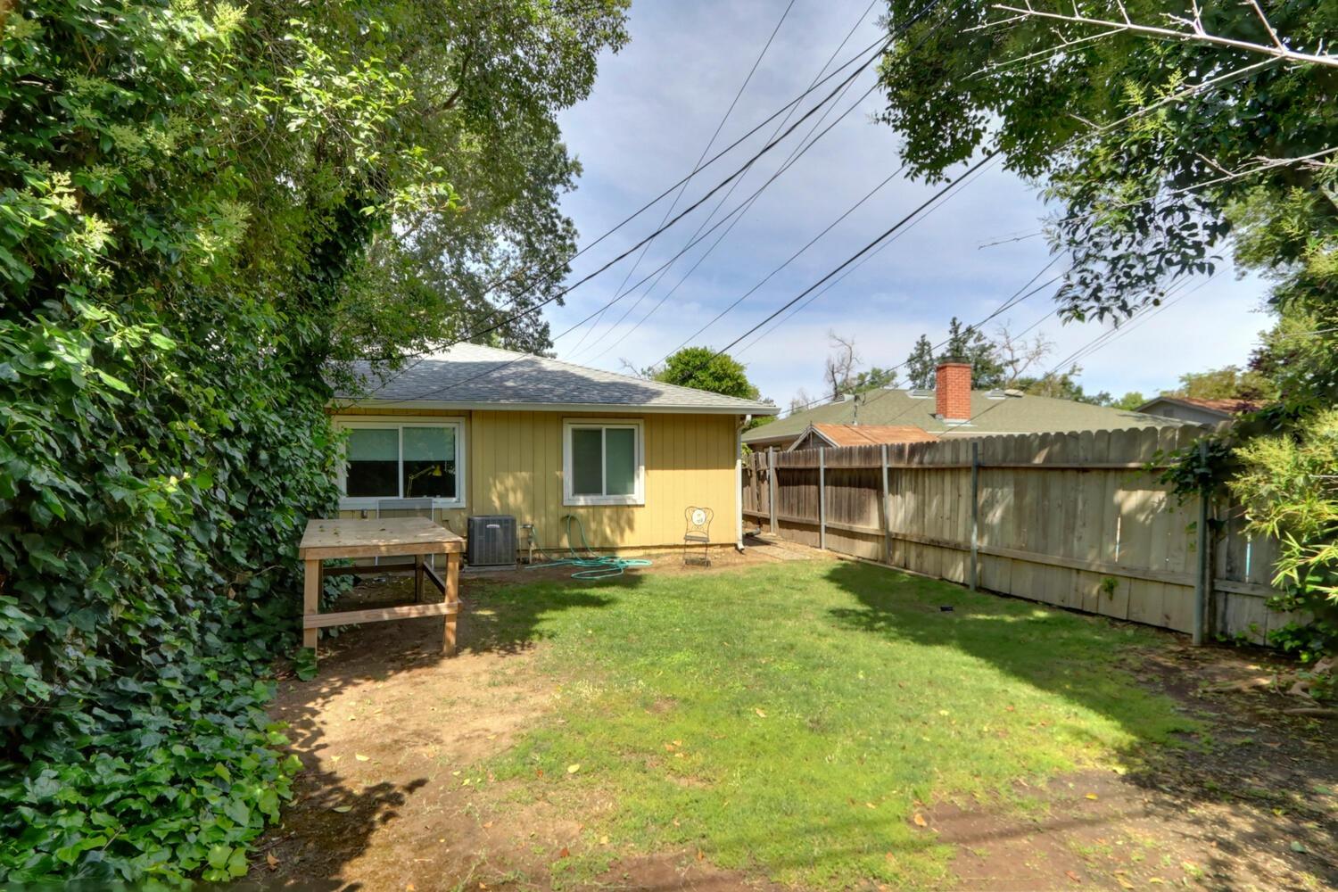 520-522 Oeste Drive Davis, CA 95616 - Photo 25 of 54 a front view of a house with a yard porch and sitting area