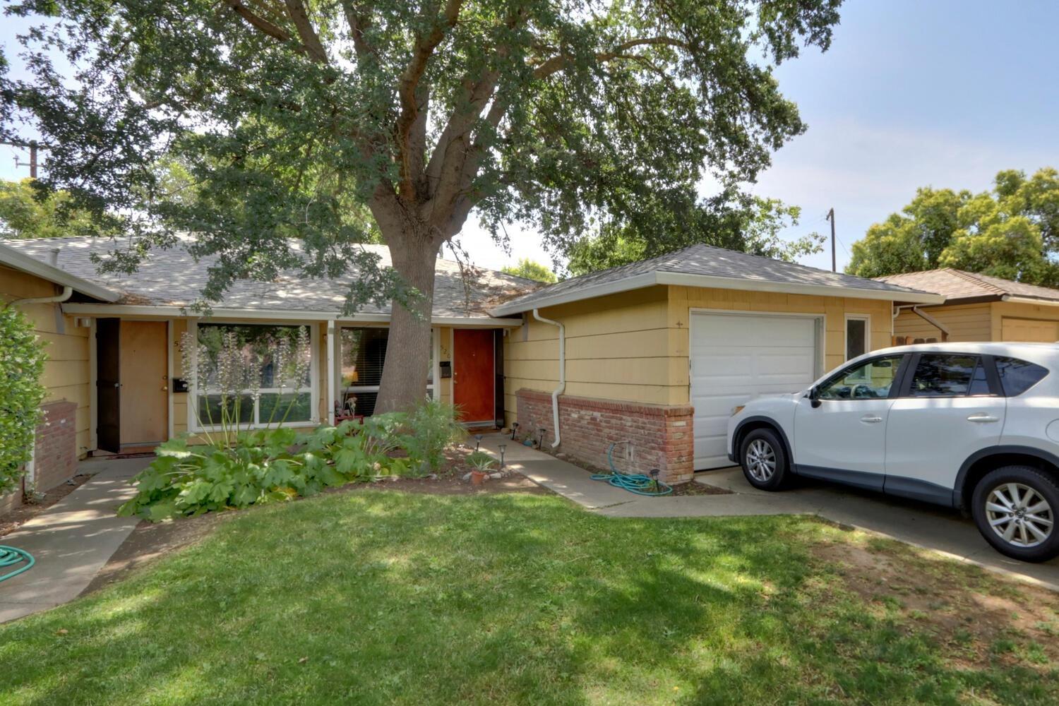 520-522 Oeste Drive Davis, CA 95616 - Photo 30 of 54 a house view with a garden space