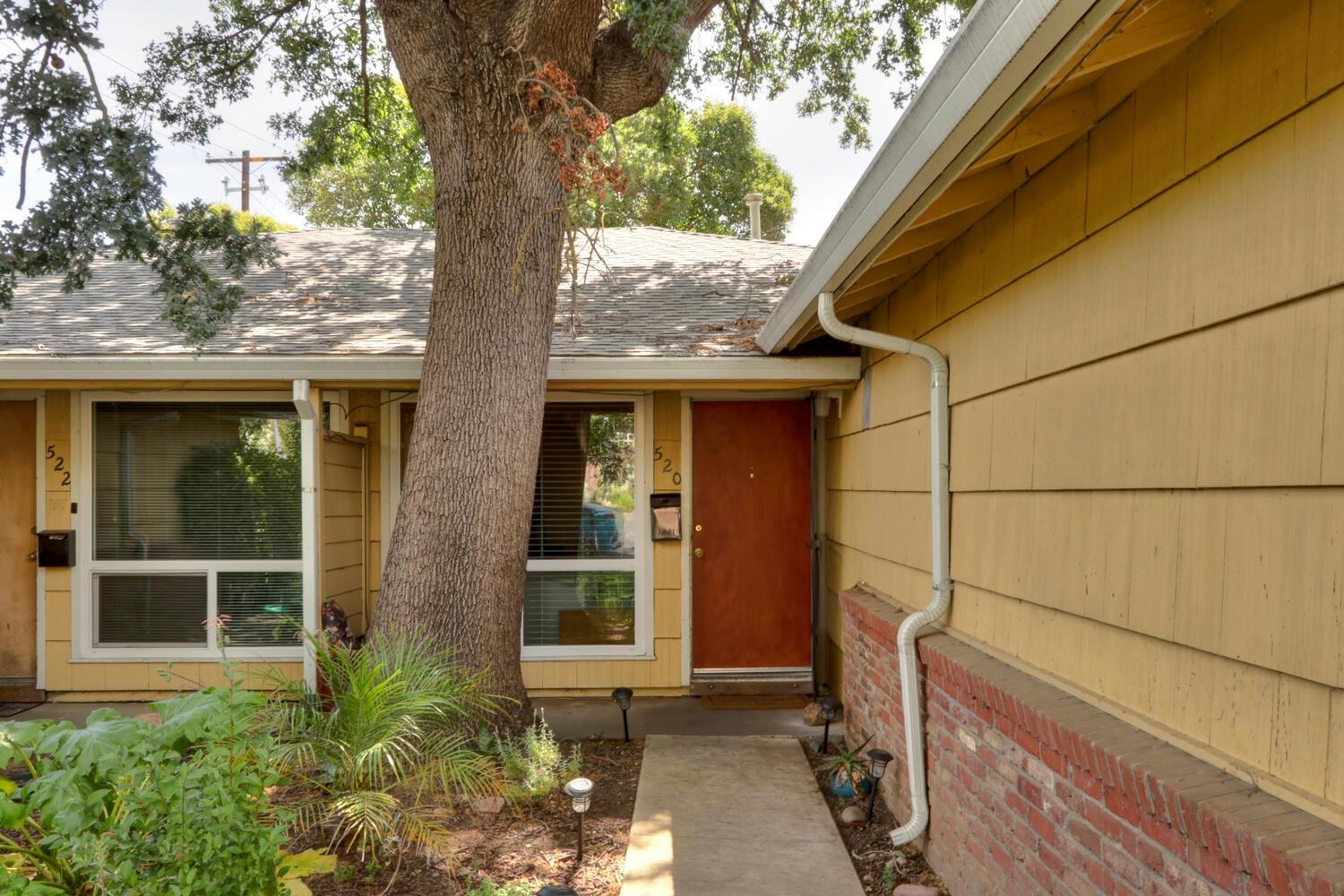 520-522 Oeste Drive Davis, CA 95616 - Photo 31 of 54 a front view of a house with a yard