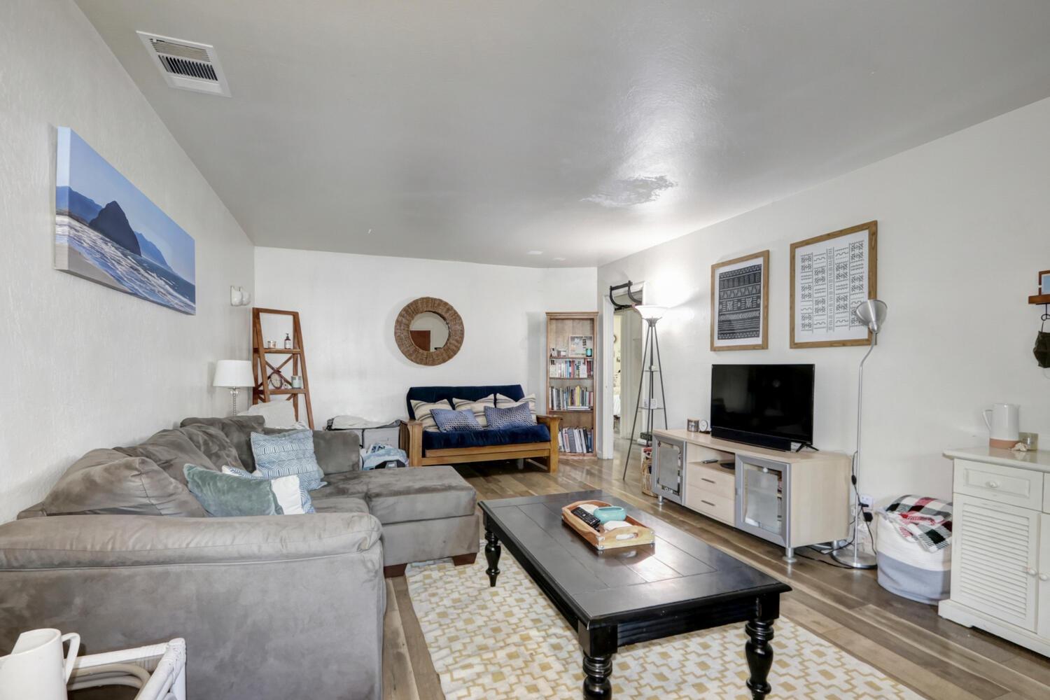 520-522 Oeste Drive Davis, CA 95616 - Photo 36 of 54 a living room with furniture and a flat screen tv