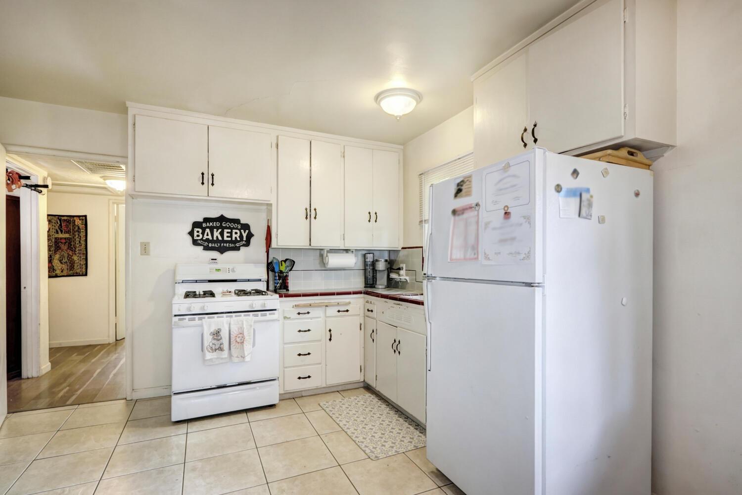 520-522 Oeste Drive Davis, CA 95616 - Photo 42 of 54 a kitchen with stainless steel appliances a refrigerator sink and cabinets