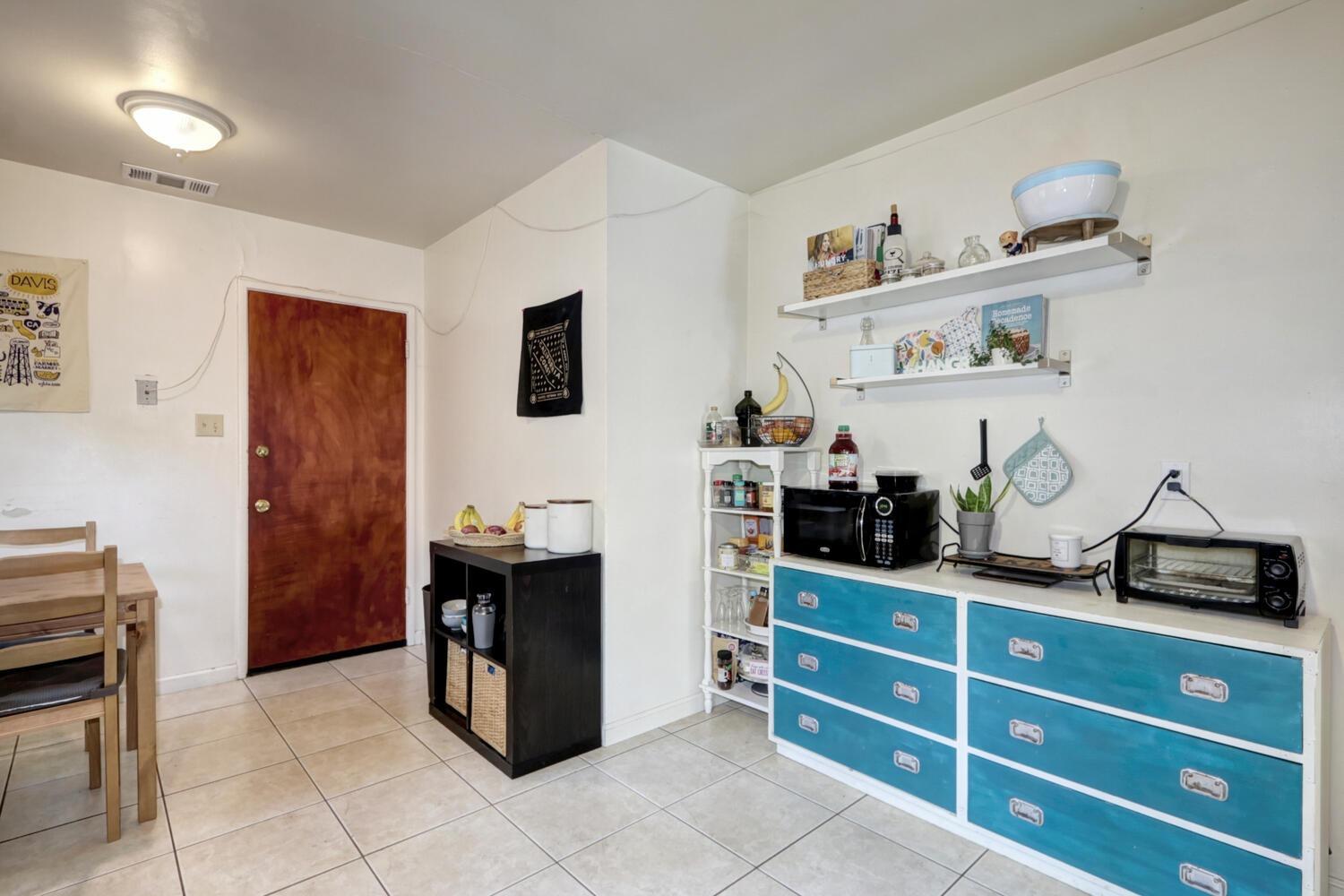 520-522 Oeste Drive Davis, CA 95616 - Photo 44 of 54 a kitchen with stainless steel appliances granite countertop a refrigerator and a stove