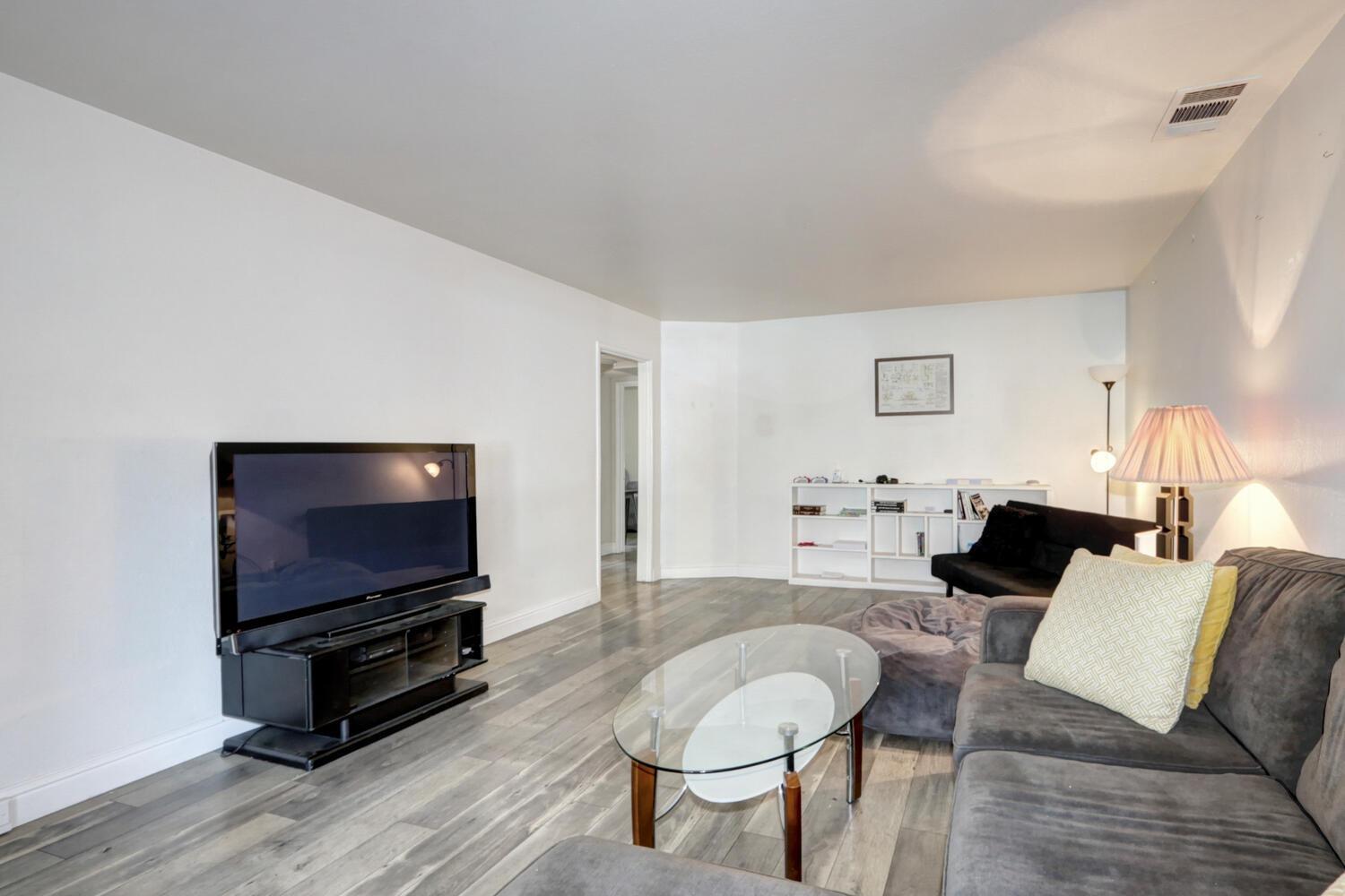 520-522 Oeste Drive Davis, CA 95616 - Photo 8 of 54 a living room with furniture and a flat screen tv