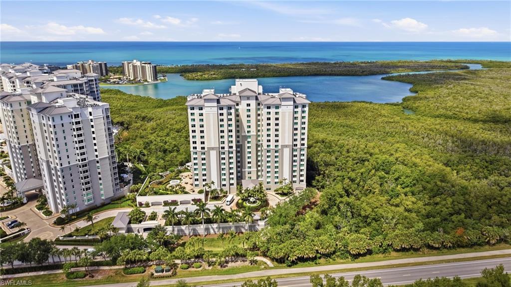 265 Indies Way, Unit 701 Naples, FL 34110 - Photo 3 of 50 a view of building with outdoor space