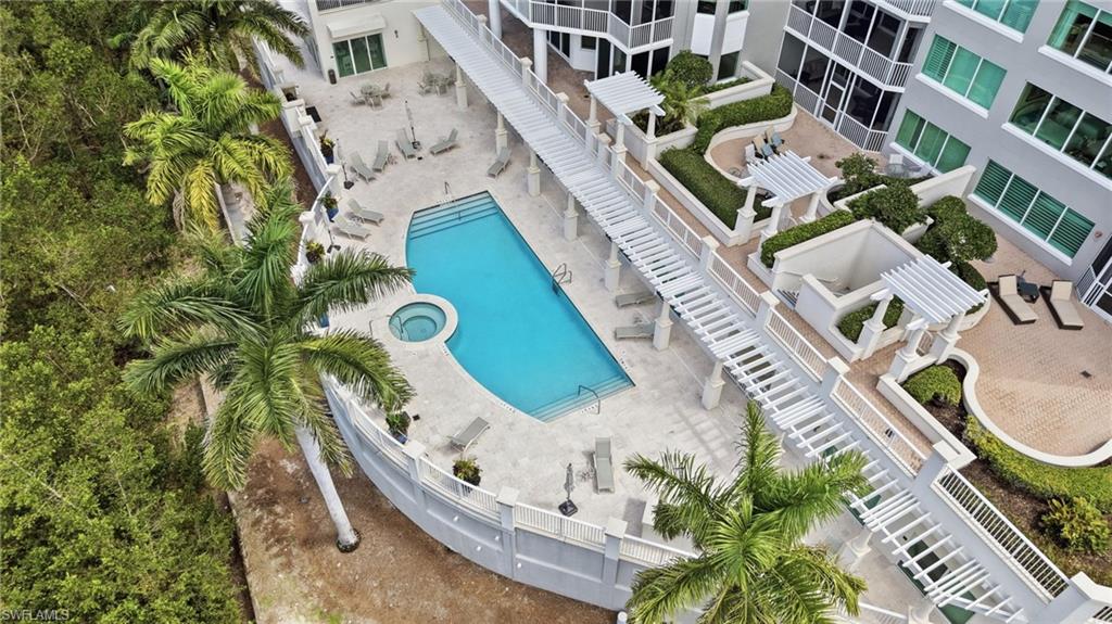 265 Indies Way, Unit 701 Naples, FL 34110 - Photo 44 of 50 an aerial view of residential houses with outdoor space