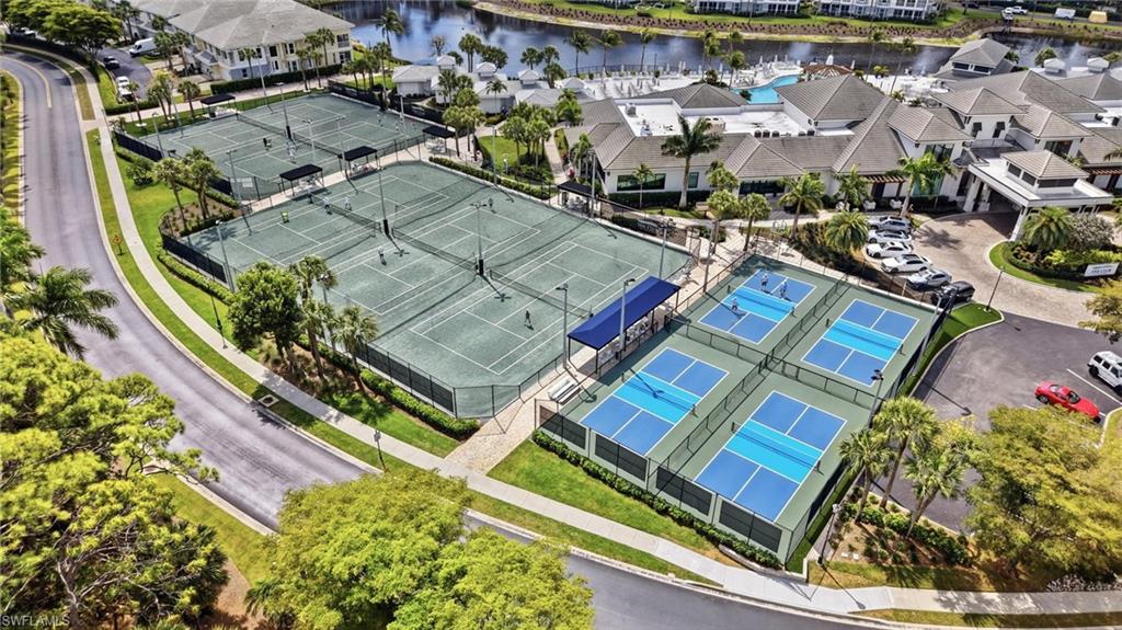 265 Indies Way, Unit 701 Naples, FL 34110 - Photo 47 of 50 an aerial view of residential house with outdoor space and swimming pool