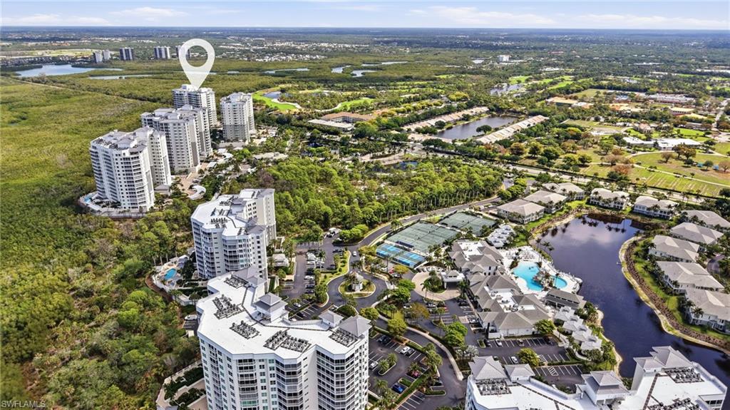 265 Indies Way, Unit 701 Naples, FL 34110 - Photo 50 of 50 an aerial view of residential houses with outdoor space