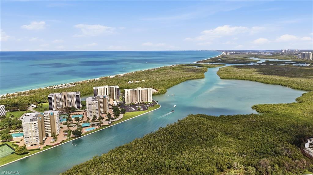 265 Indies Way, Unit 701 Naples, FL 34110 - Photo 5 of 50 a view of a city with an ocean view