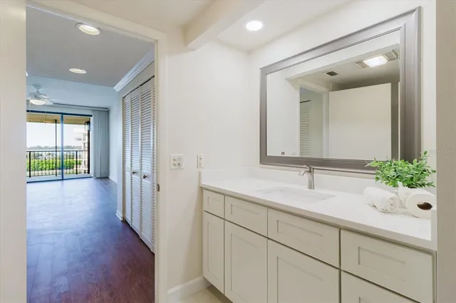 a bathroom with a double vanity sink and mirror