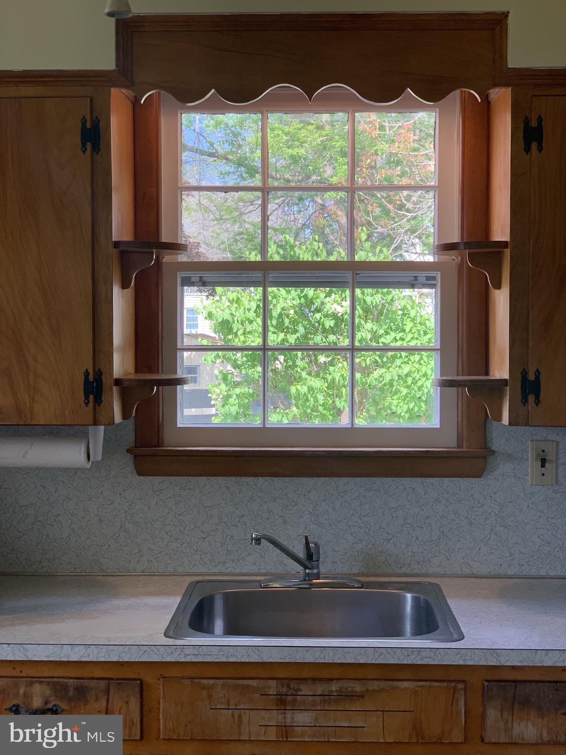 150 Lincoln Road Westminster, MD 21157 - Photo 12 of 39 a kitchen with a sink a window and stainless steel appliances