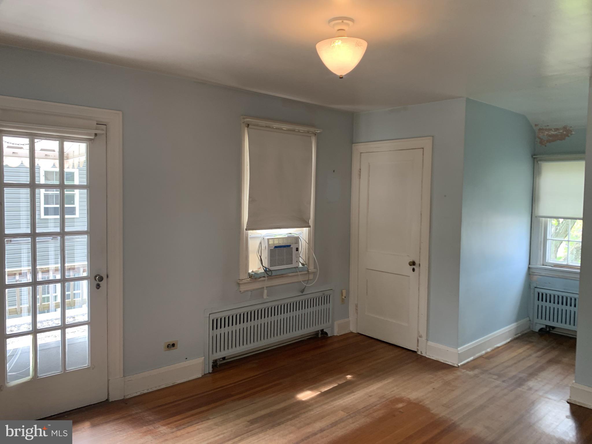 150 Lincoln Road Westminster, MD 21157 - Photo 14 of 39 a view of an empty room with wooden floor and a window