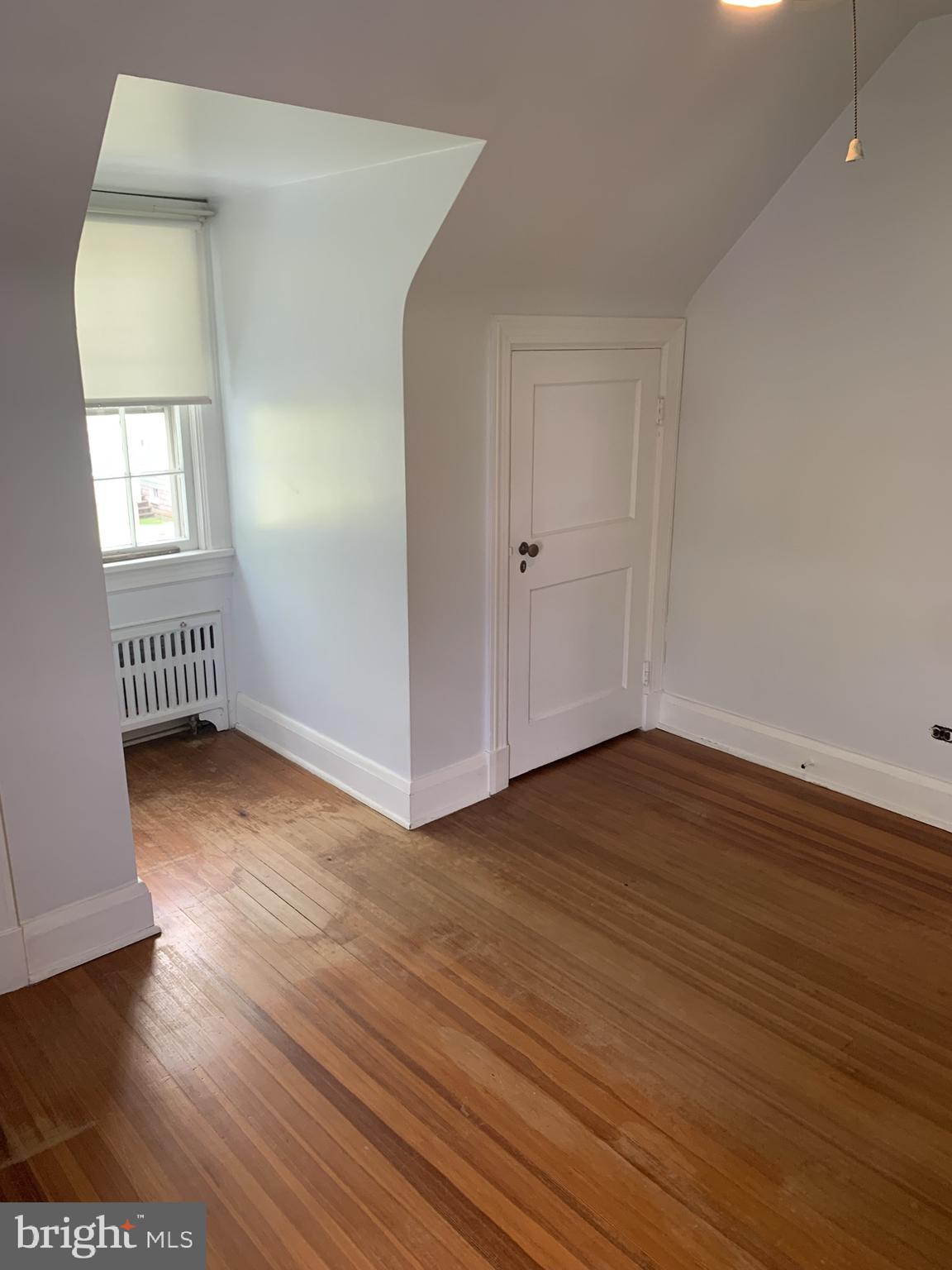 150 Lincoln Road Westminster, MD 21157 - Photo 16 of 39 an empty room with wooden floor and windows