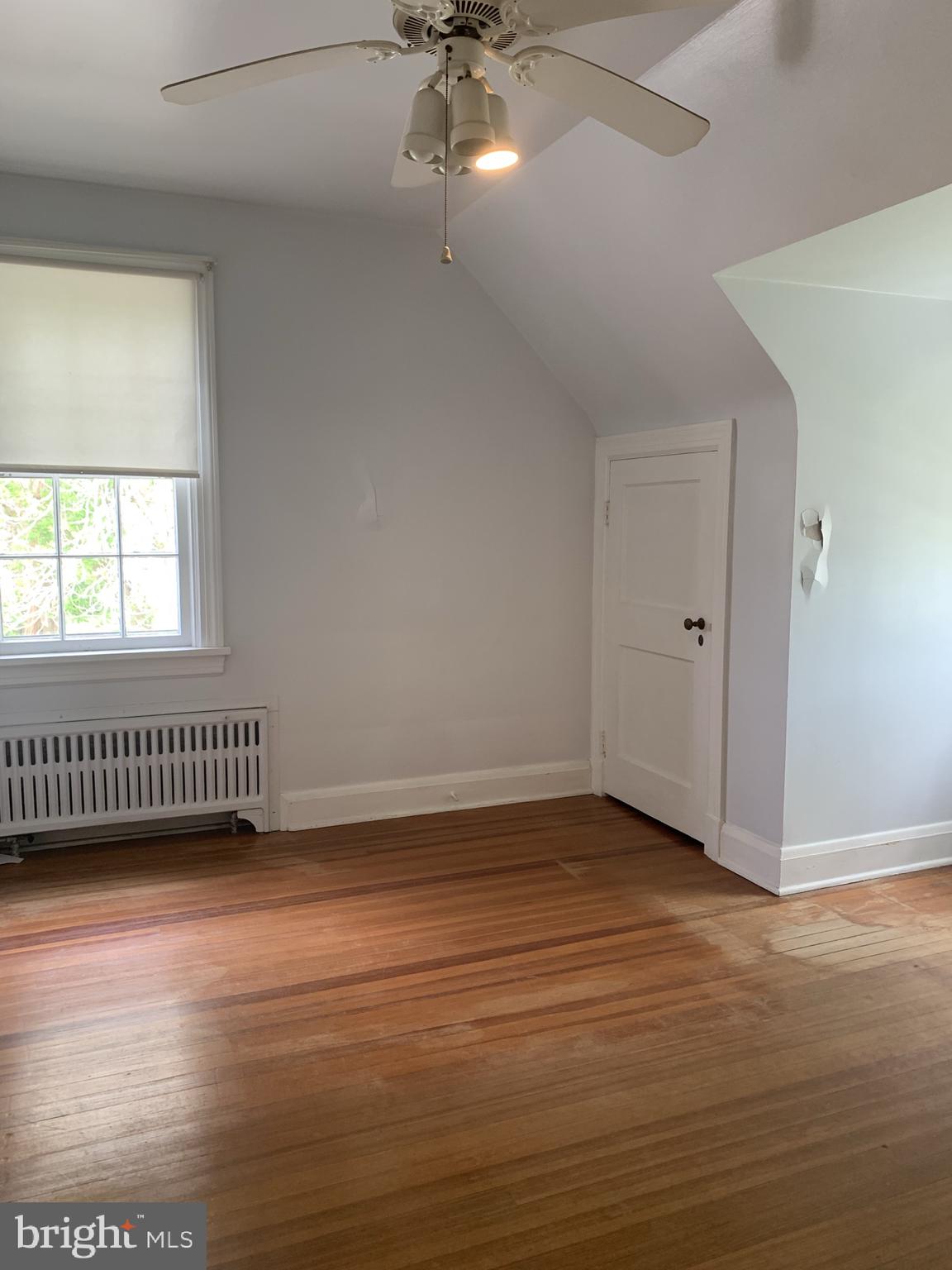 150 Lincoln Road Westminster, MD 21157 - Photo 18 of 39 an empty room with wooden floor and windows