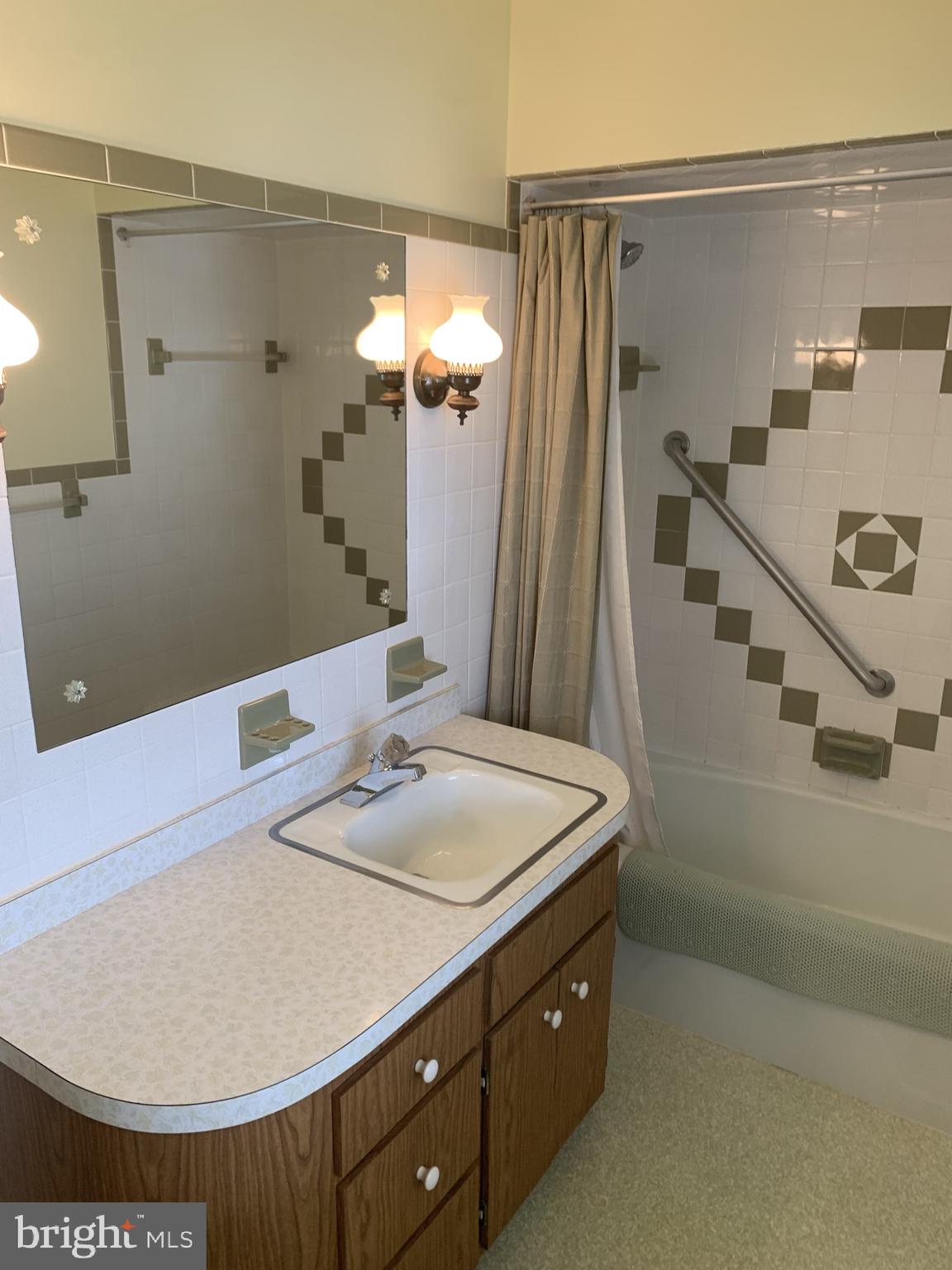 150 Lincoln Road Westminster, MD 21157 - Photo 21 of 39 a bathroom with a sink and a mirror