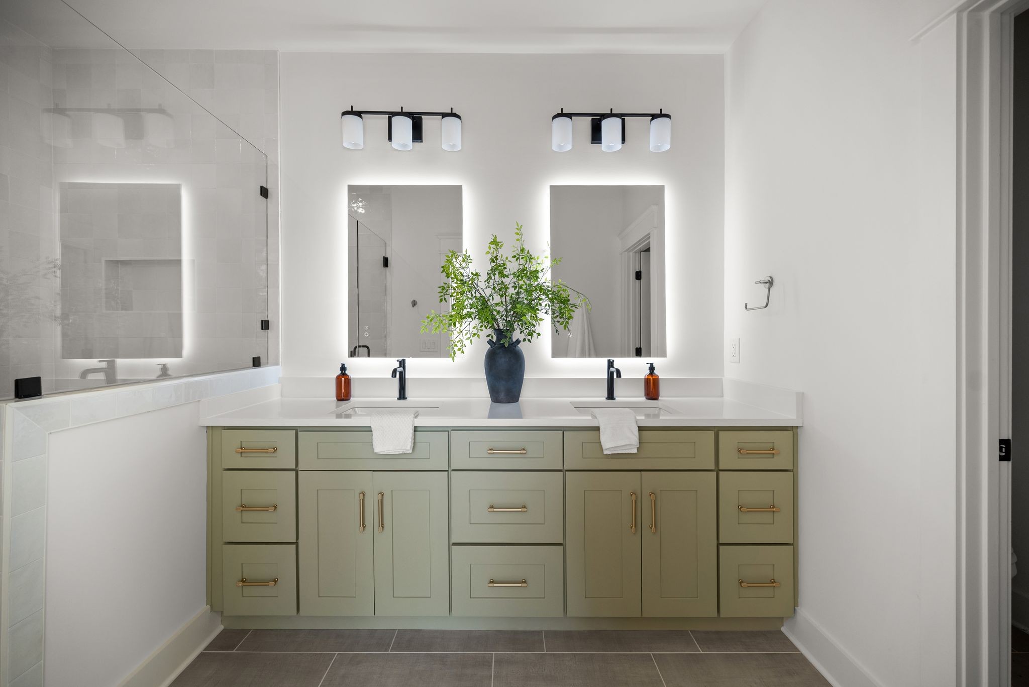 6103 Henry Ford Drive Nashville, TN 37209 - Photo 25 of 40 a bathroom with a double vanity sink and mirror