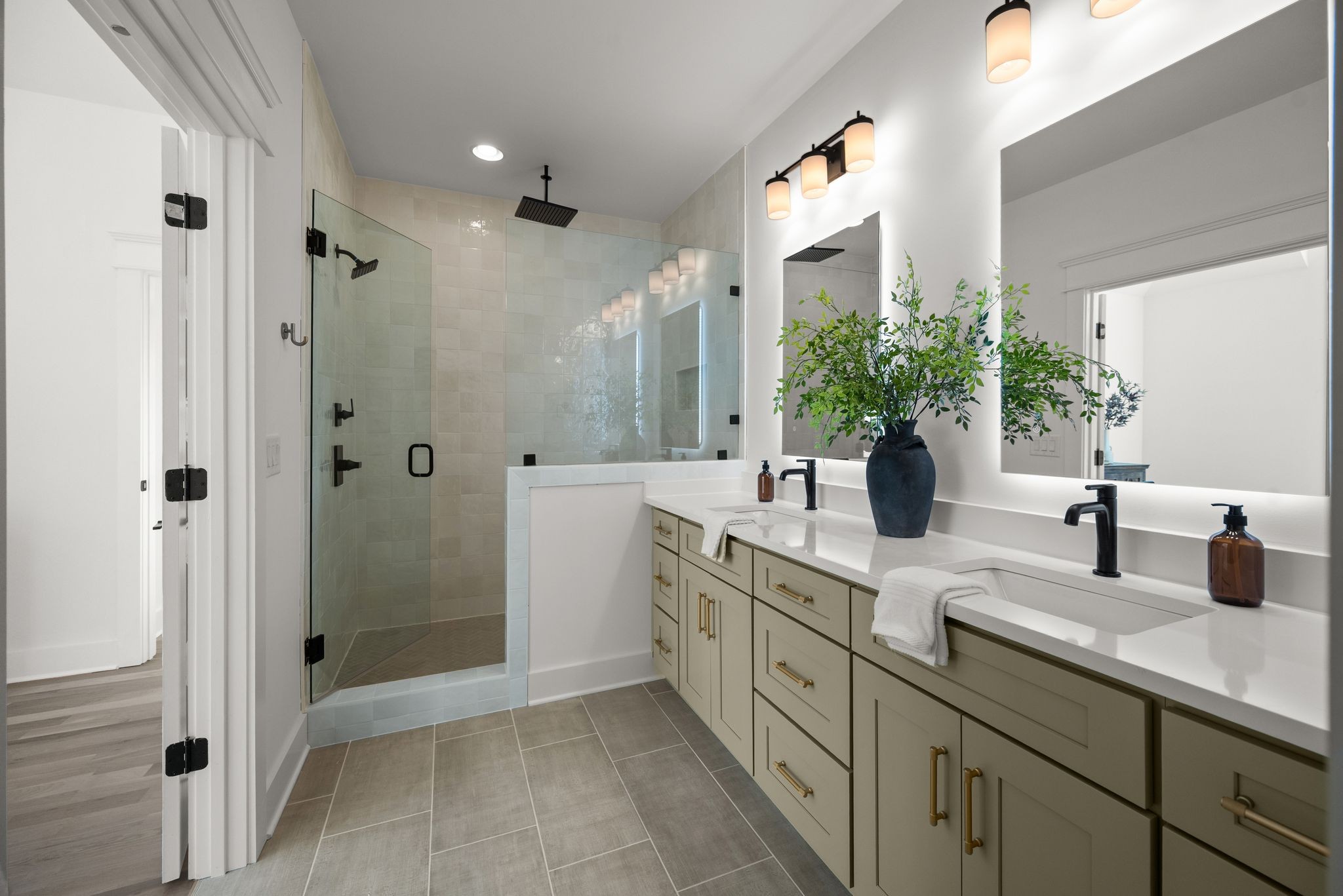 6103 Henry Ford Drive Nashville, TN 37209 - Photo 27 of 40 a spacious bathroom with a granite countertop sink mirror and shower