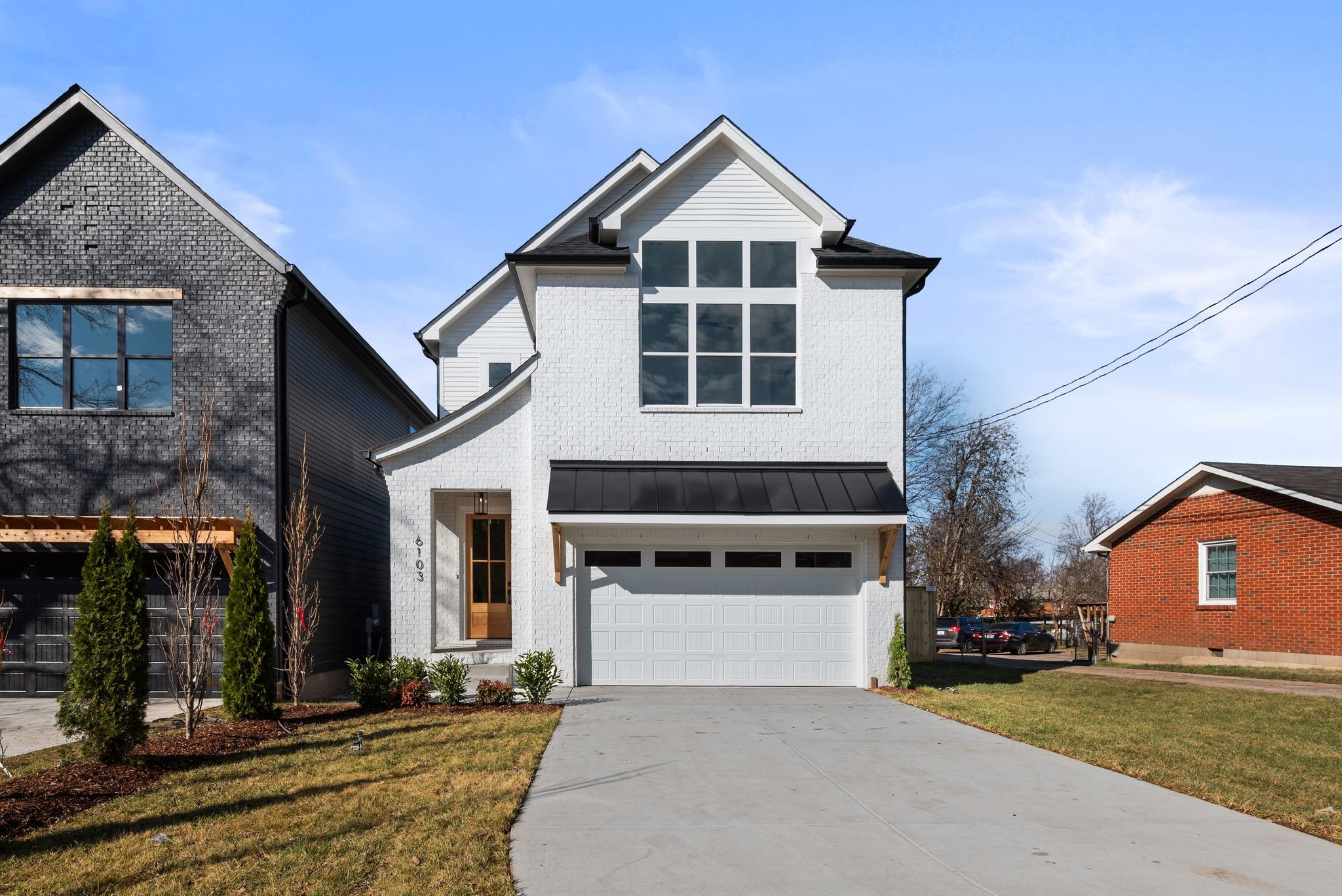 6103 Henry Ford Drive Nashville, TN 37209 - Photo 3 of 40 a front view of a house with a yard