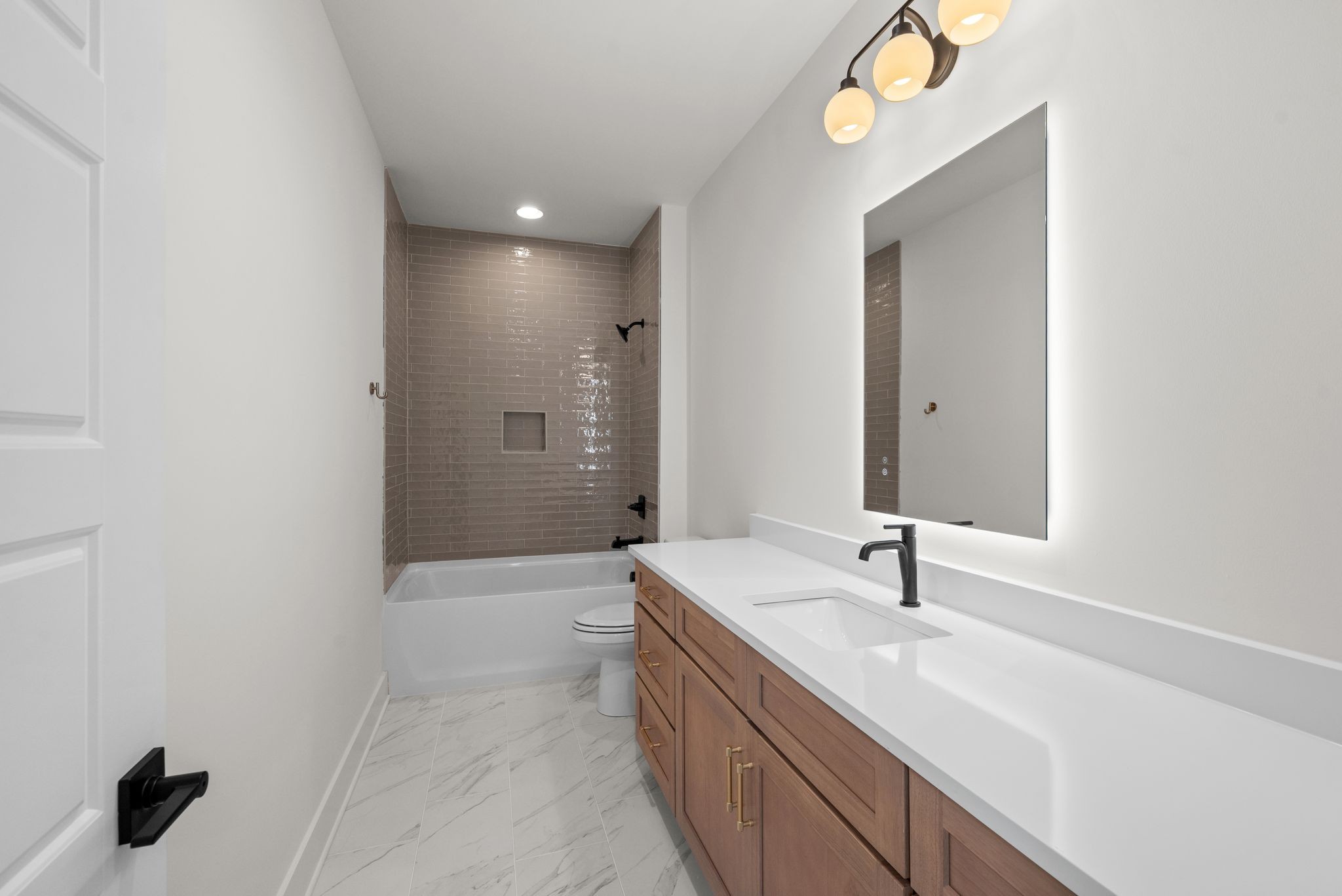 6103 Henry Ford Drive Nashville, TN 37209 - Photo 33 of 40 a bathroom with a sink a toilet and shower