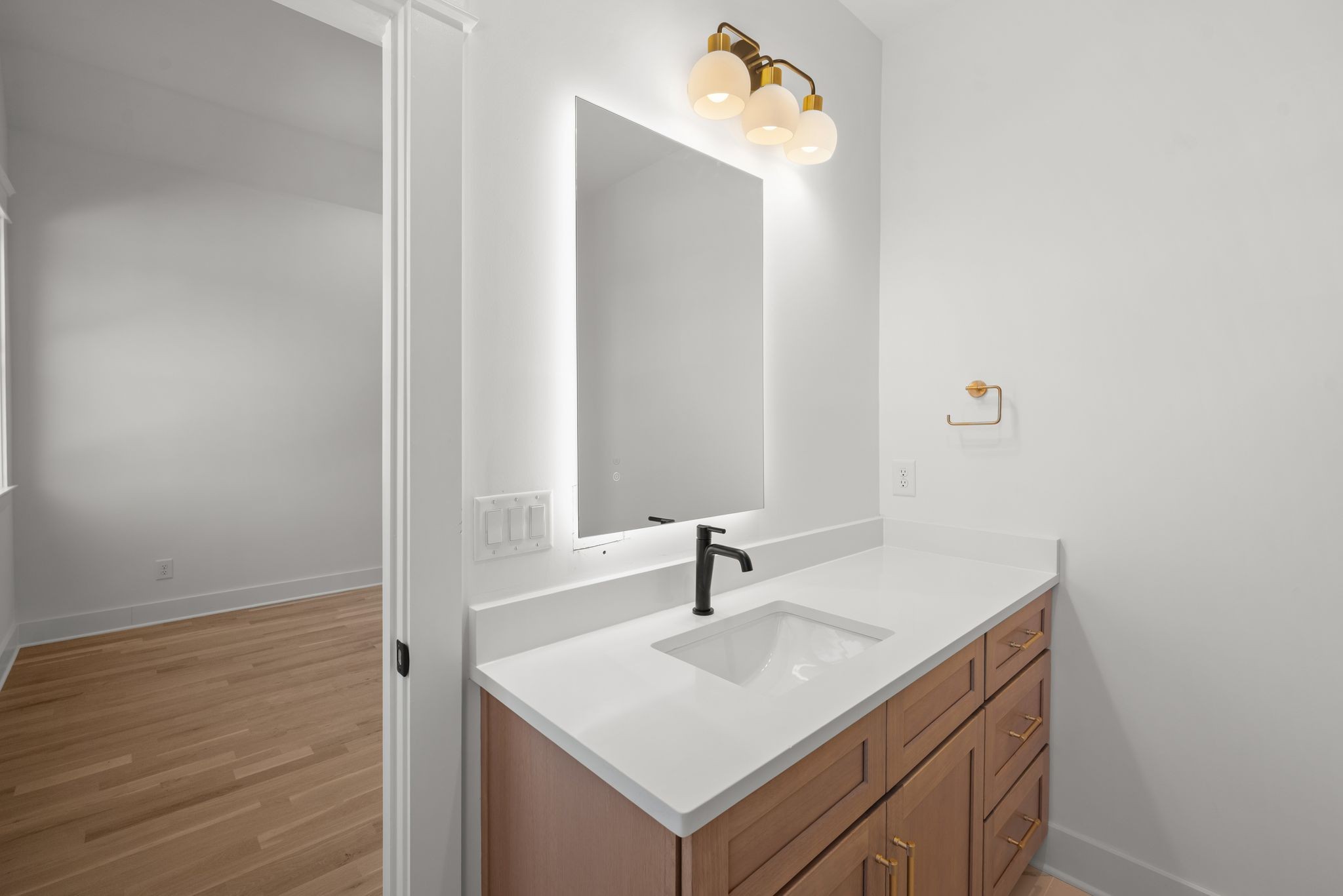 6103 Henry Ford Drive Nashville, TN 37209 - Photo 36 of 40 a bathroom with a sink and a mirror