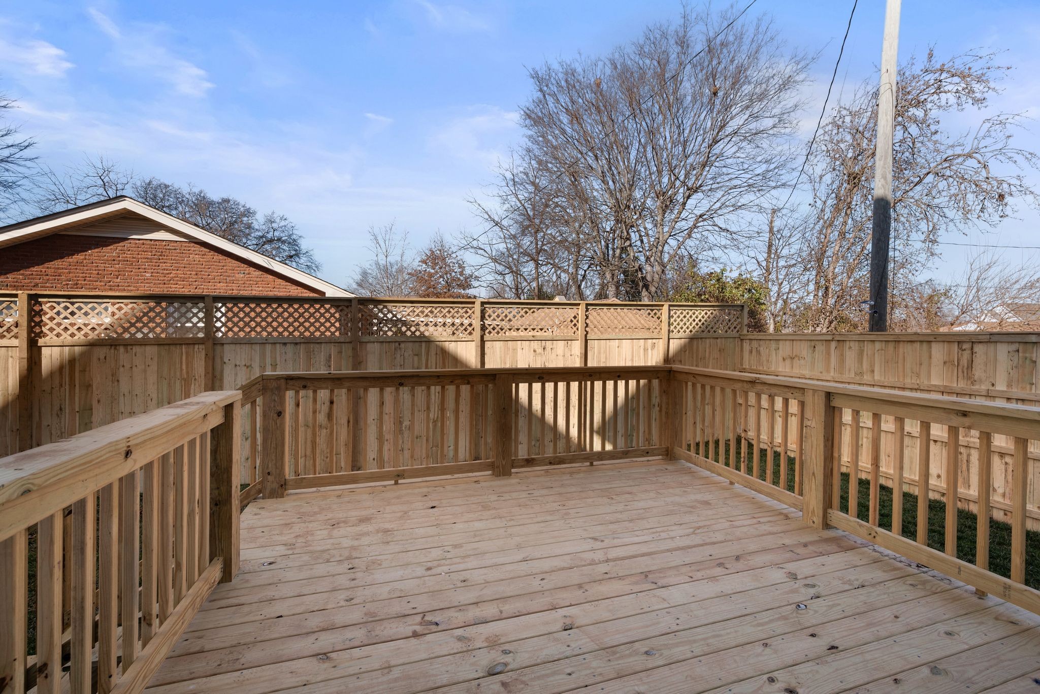 6103 Henry Ford Drive Nashville, TN 37209 - Photo 38 of 40 a balcony with wooden floor and fence