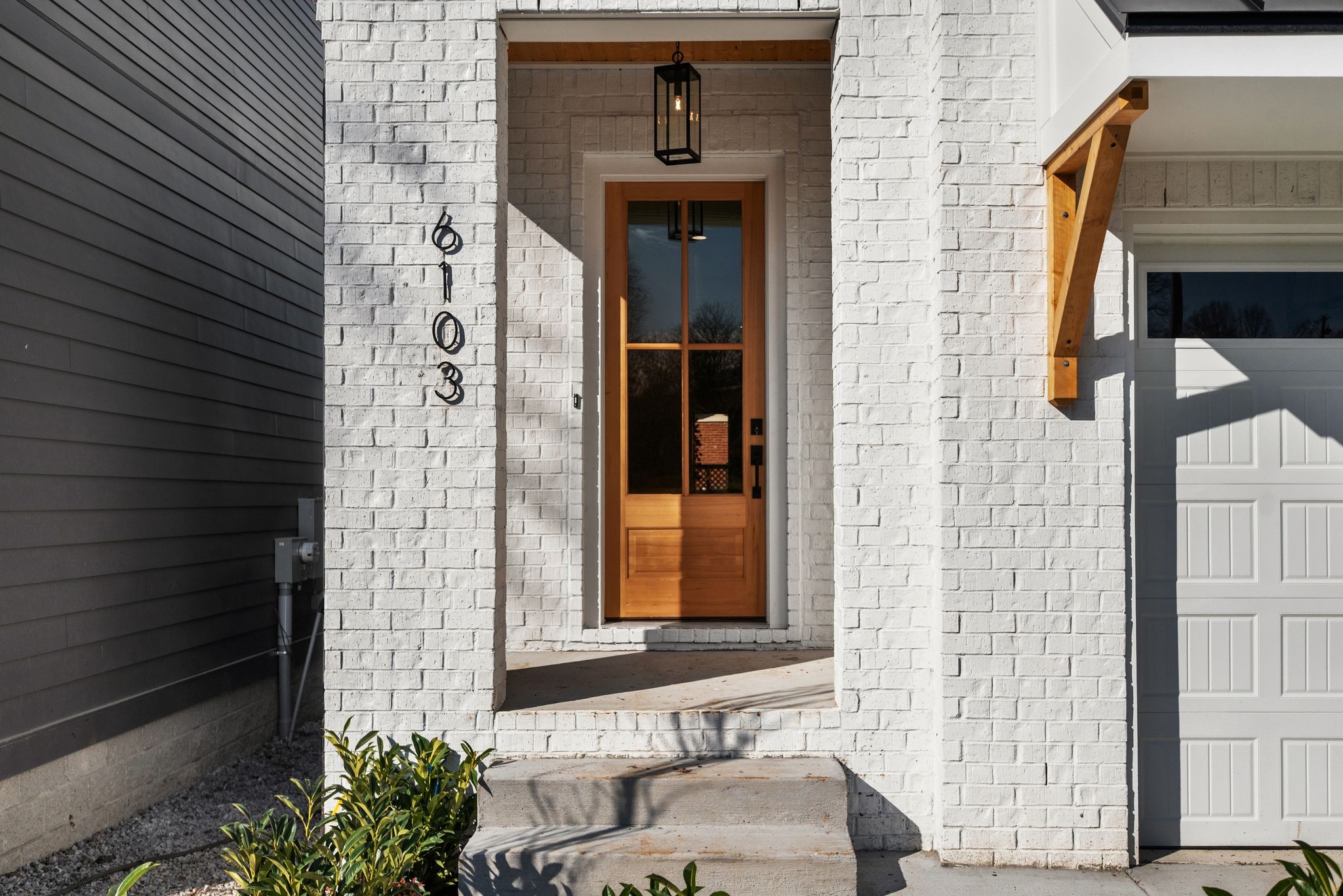 6103 Henry Ford Drive Nashville, TN 37209 - Photo 4 of 40 a front view of a house with a yard