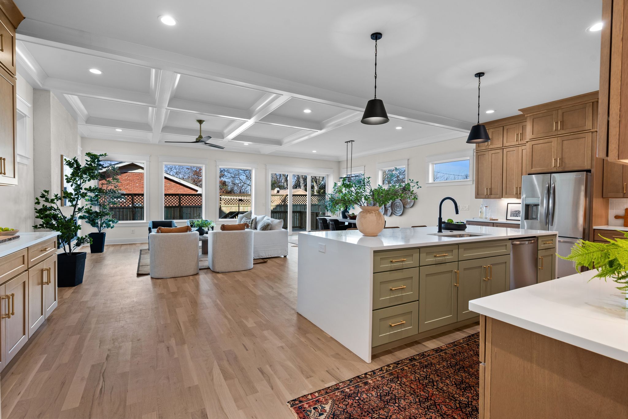 6103 Henry Ford Drive Nashville, TN 37209 - Photo 7 of 40 a kitchen with sink cabinets and wooden floor