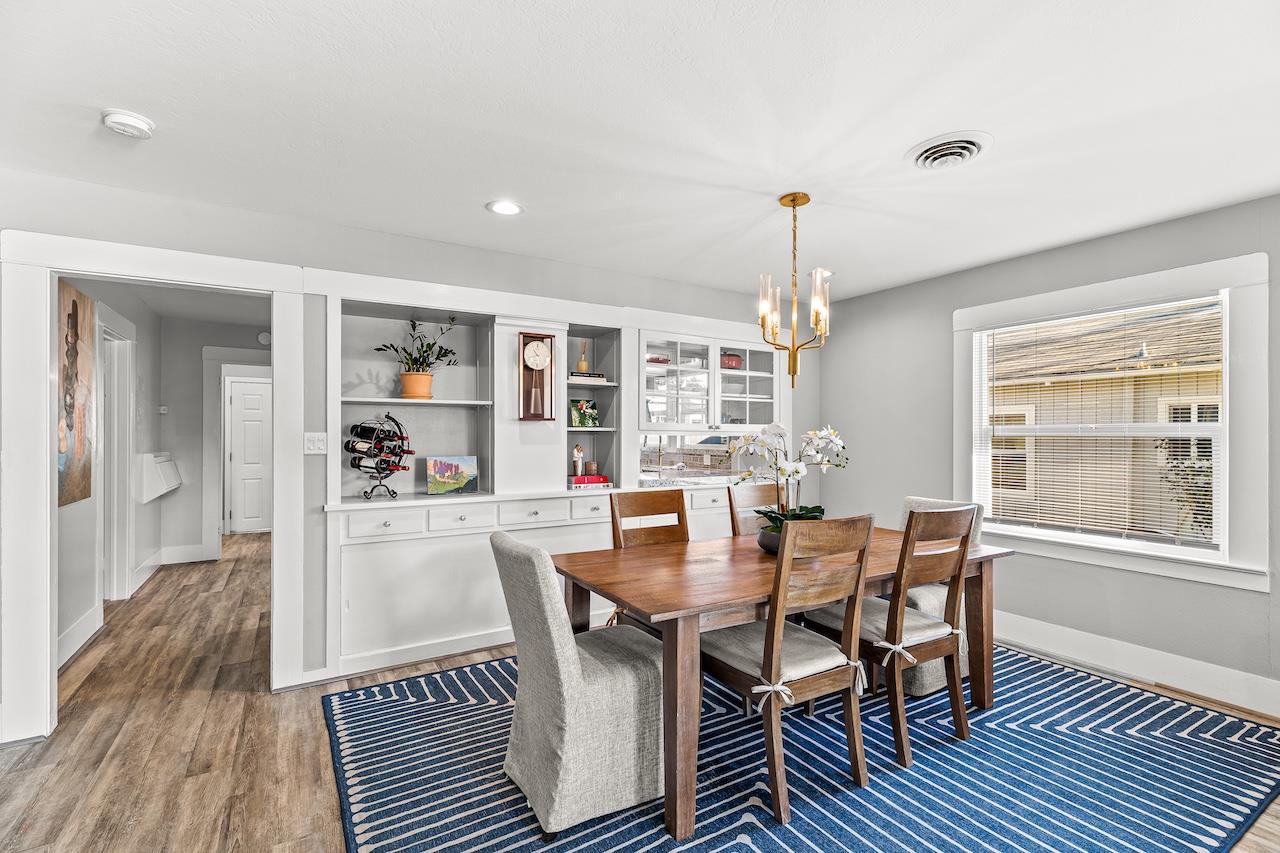 319 West 12th Street Tracy, CA 95376 - Photo 16 of 51 a dining room with furniture window and wooden floor