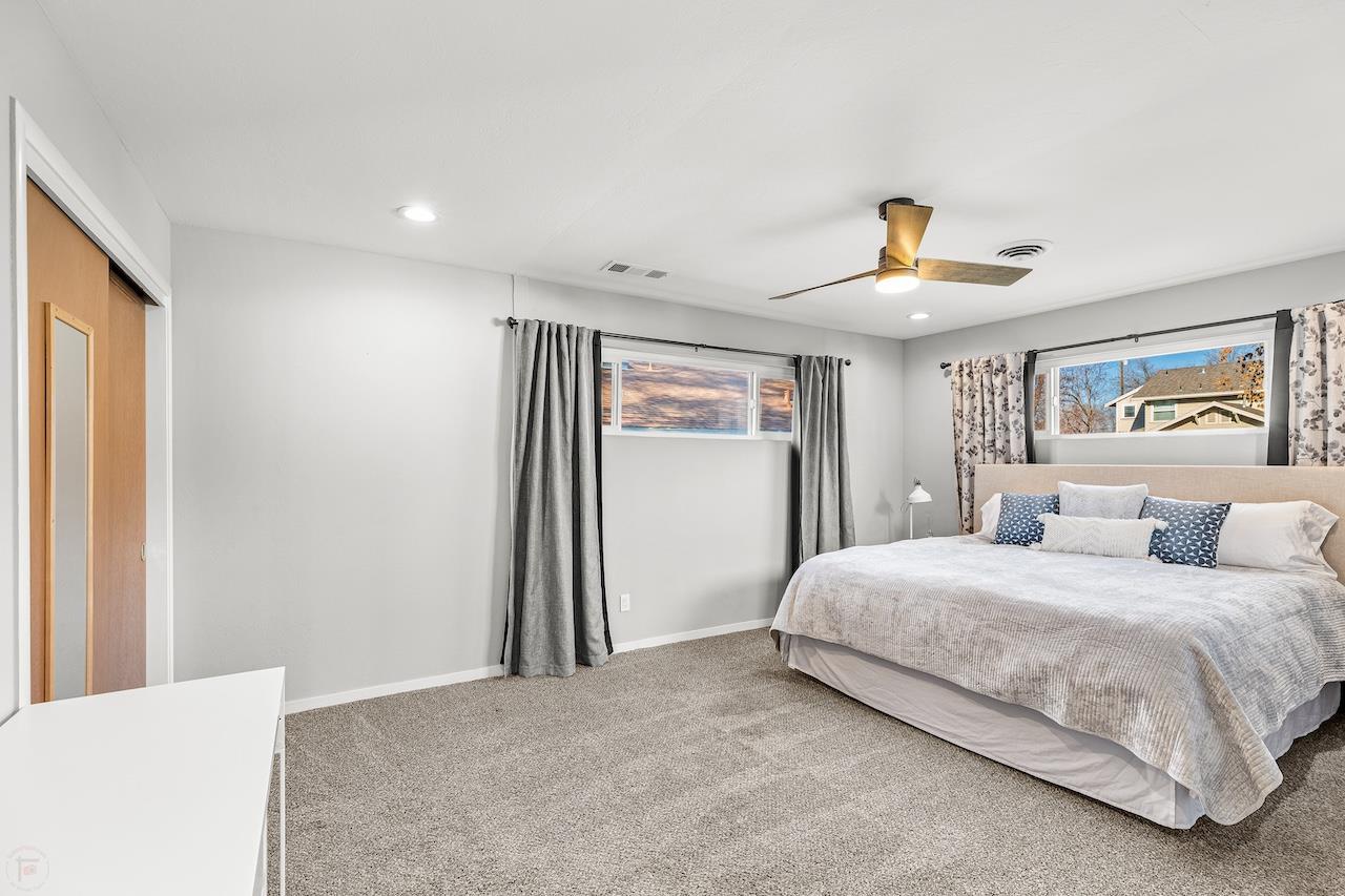 319 West 12th Street Tracy, CA 95376 - Photo 24 of 51 a bedroom with a large bed and a window