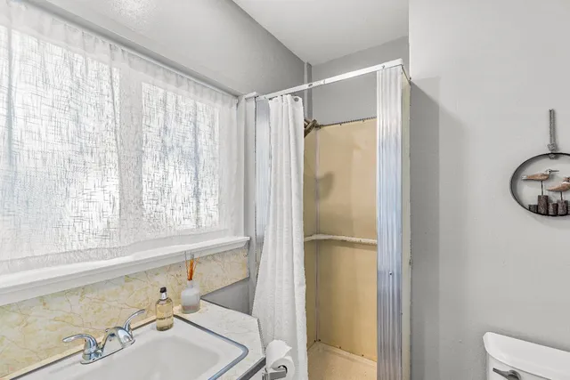 a view of a bedroom from a hallway