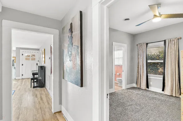 a view of living room with furniture and window