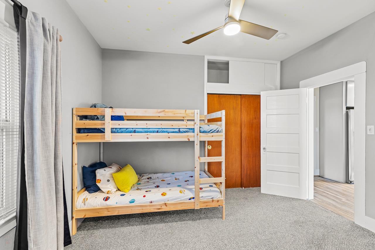 319 West 12th Street Tracy, CA 95376 - Photo 30 of 51 a bed room with a bed and furniture