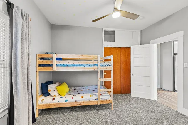 a view of a hallway with elevator and door