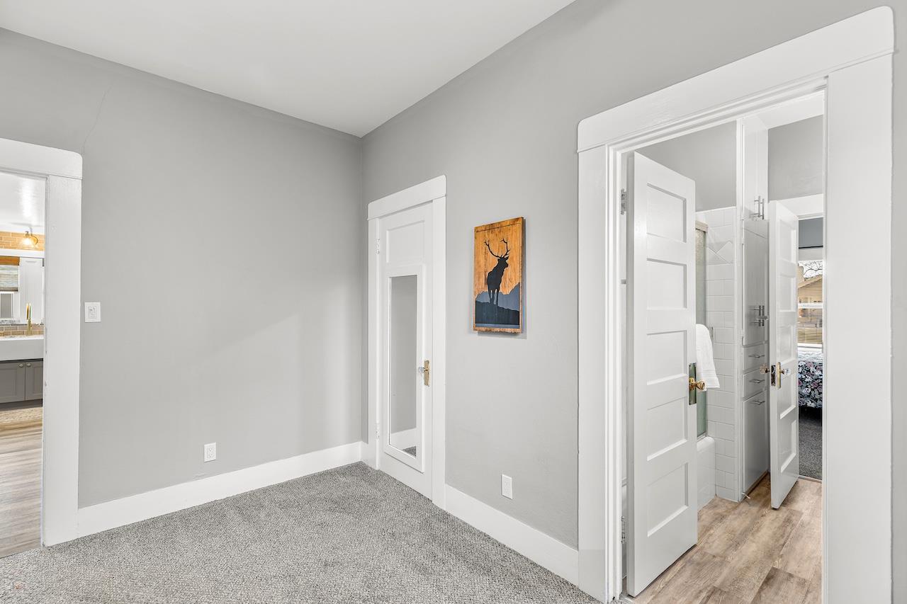 319 West 12th Street Tracy, CA 95376 - Photo 31 of 51 a view of a hallway with elevator and door