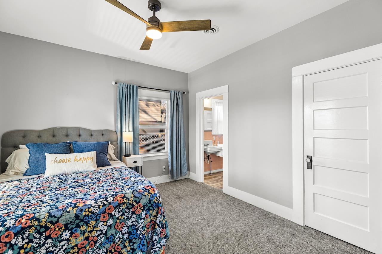 319 West 12th Street Tracy, CA 95376 - Photo 35 of 51 a bedroom with a large bed and a window