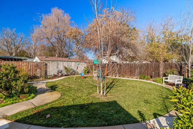 a view of a park with a slide
