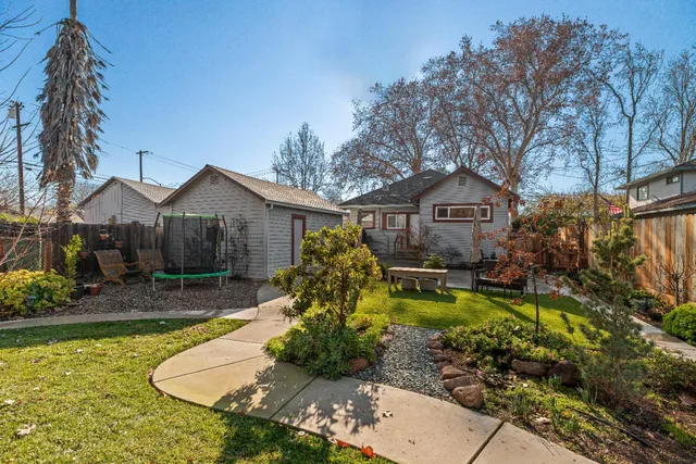 a picture of a bench in front of a window