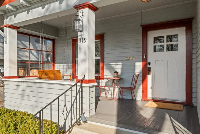 a view of a balcony with chairs