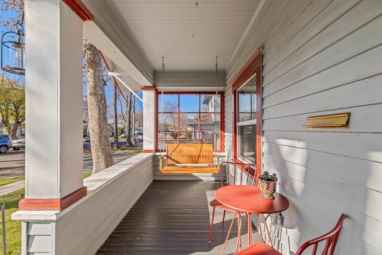 319 West 12th Street Tracy, CA 95376 - Photo 6 of 51 a balcony with furniture and wooden floor