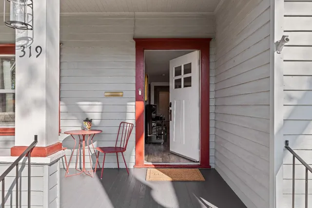 a view of a living room and dining room