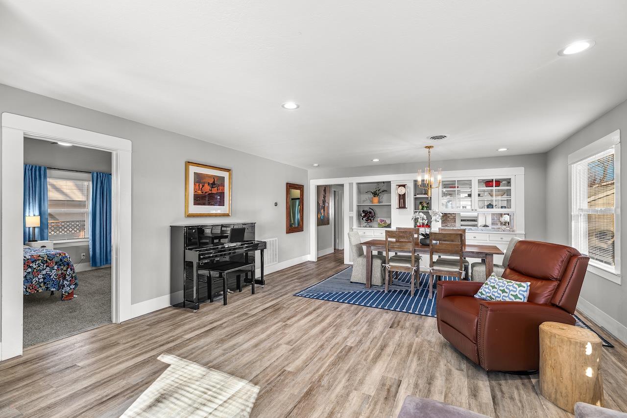 319 West 12th Street Tracy, CA 95376 - Photo 10 of 51 a living room with furniture and a wooden floor